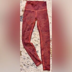 Lululemon Winder Train High Rise Tights in Crackle Glaze Orange